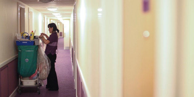 A chambermaid prepares her cleaning trolley at a Premier Inn hotel at Heathrow airport in London, U.K., on Friday, April 20, 2012. Whitbread Plc, the owner of Premier Inn budget lodges, reported slowing sales growth as a tough market for U.K. hotels countered an improvement in demand at its Costa Coffee shops. Photographer: Chris Ratcliffe/Bloomberg via Getty Images