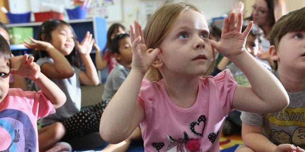 SAN DIEGO, CA - OCTOBER 01: Children at Scripps Ranch KinderCare in San Diego play in their classroom on October 1, 2013 in San Diego, CA. Later, LuAnn Cline, a Prekindergarten teacher at the center, was surprised with the Early Childhood Educator Award and a $10,000 check from Knowledge Universe. (Photo by Robert Benson/Getty Images for Knowledge Universe)