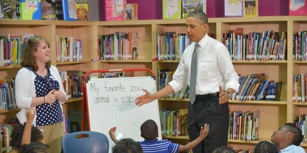 US President Barack Obama gestures while speaking to students in a pre-K class during a visit to Moravia Park Elementary School on May 17, 2013 in Baltimore, Maryland. Obama is visiting Baltimore on what the administration called ' his second Middle Class Jobs and Opportunity Tour'. AFP PHOTO/Mandel NGAN (Photo credit should read MANDEL NGAN/AFP/Getty Images)