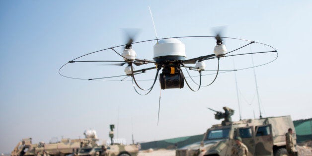 A Mikado drone of the Bundeswehr flies during a show of German soldiers at Camp Marmal in Mazar-e-Sharif on December 23, 201