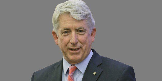 Mark Herring headshot, as Virginia Attorney General-elect, graphic element on gray