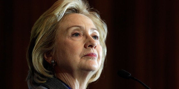 WASHINGTON, DC - DECEMBER 06: Former U.S. Secretary of State Hillary Clinton delivers remarks after being presented the 2013 Tom Lantos Human Rights Prize December 6, 2013 in Washington, DC. Clinton received the award for her work in the areas of women's rights and internet freedom. (Photo by Win McNamee/Getty Images)