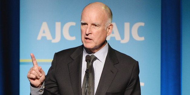 BEVERLY HILLS, CA - JANUARY 29: California Gov. Jerry Brown presents onstage at the AJC Los Angeles' Ira E. Yellin Community Leadership Award honoring David Bohnett at Regent Beverly Wilshire Hotel on January 29, 2014 in Beverly Hills, California. (Photo by Michael Kovac/WireImage)