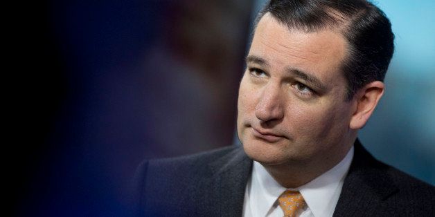 Senator Ted Cruz, a Republican from Texas, has a conversation following a Bloomberg Television interview in Washington, D.C., U.S., on Thursday, Jan. 30, 2014. Cruz vowed to use a debate over raising the federal debt ceiling as leverage to extract a new round of U.S. spending cuts, even as House Speaker John Boehner told reporters that defaulting would be 'the wrong thing' for the country. Photographer: Andrew Harrer/Bloomberg via Getty Images 