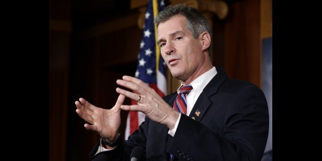 FILE - In this Nov. 13, 2012 file photo, Sen. Scott Brown, R-Mass., speaks during a media availability, on Capitol Hill in Washington. Brown, who was defeated in his re-election bid, said Friday, Feb. 1, 2013 that he will not run for the Senate seat vacated by John Kerry, who was named secretary of state. (AP Photo/Alex Brandon, File)