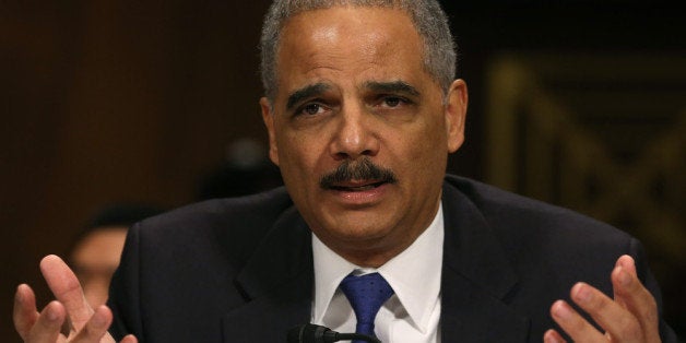 WASHINGTON, DC - JANUARY 29: Attorney General Eric Holder testifies during a Senate Judiciary Committee hearing on Capotil H