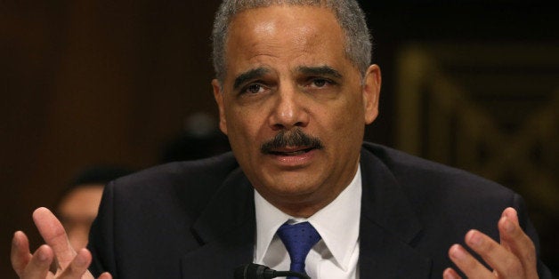 WASHINGTON, DC - JANUARY 29: Attorney General Eric Holder testifies during a Senate Judiciary Committee hearing on Capotil Hill, on January 29, 2014 in Washington, DC. The committee is hearing testimony on oversight of the Justice Department and reform of government surveillance programs. (Photo by Mark Wilson/Getty Images)