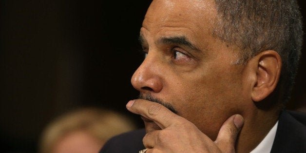 WASHINGTON, DC - JANUARY 29: Attorney General Eric Holder testifies during a Senate Judiciary Committee hearing on Capotil Hill, on January 29, 2014 in Washington, DC. The committee is hearing testimony on oversight of the Justice Department and reform of government surveillance programs. (Photo by Mark Wilson/Getty Images)