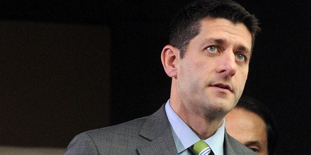 US Rep. Paul Ryan, R-WI, walks to a meeting at the Capitol Hill in Washington, DC, on October 16, 2013. Senate Majority Leader Harry Reid said Wednesday that a deal had been reached with Republican leaders to end a fiscal impasse that has threatened the United States with default. Reid, speaking from the Senate floor, said the agreement called for reopening the federal government with a temporary budget until January 15 and to extend US borrowing authority until February 7. AFP Photo/Jewel Samad (Photo credit should read JEWEL SAMAD/AFP/Getty Images)