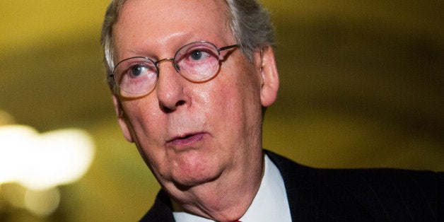 WASHINGTON, DC - NOVEMBER 21: (L-R) Sen. Lamar Alexander (R-TN) looks on as Senate Minority Leader Mitch McConnell (R-KY) speaks during a news conference on Capitol Hill, November 21, 2013 in Washington, DC. The Senate voted 52-48 to invoke the so-called 'nuclear option', voting to change Senate rules on the controversial filibuster for most presidential nominations with a simple majority vote. (Photo by Drew Angerer/Getty Images)