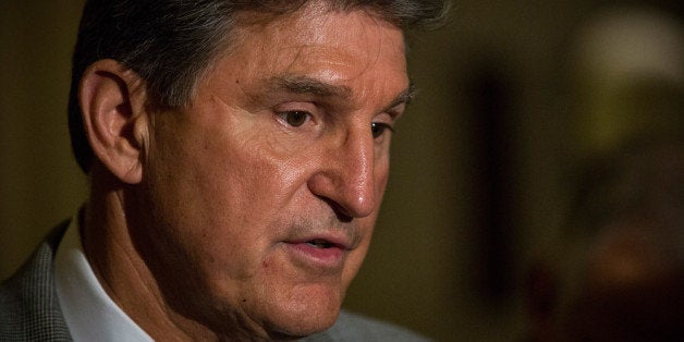 WASHINGTON, DC - OCTOBER 14: Sen. Joe Manchin III (D-WV) talks to members of the media at the Capitol Building on October 14, 2013 in Washington, DC. As Democratic and Republican leaders negotiate an end to the shutdown and a way to raise the debt limit, the White House postponed a planned Monday afternoon meeting with Boehner and other Congressional leaders. The government shutdown is currently in its 14th day. (Photo by Andrew Burton/Getty Images)