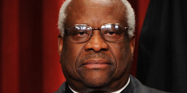 WASHINGTON, DC - OCTOBER 8: Justice Clarence Thomas pictured as the nine members of the Supreme Court pose for a new group photograph to reflect their newest member, Elena Kagan, October, 08, 2010 in Washington, DC. (Photo by Bill O'Leary/The Washington Post via Getty Images)