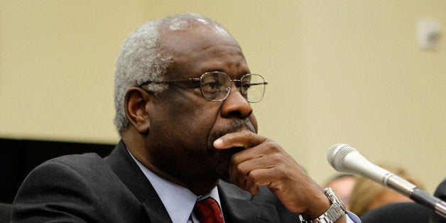 WASHINGTON - APRIL 15: U.S. Supreme Court Justices Clarence Thomas (L) and Stephen Breyer (R) testify during a hearing before the Financial Services and General Government Subcommittee of the House Appropriations Committee April 15, 2010 on Capitol Hill in Washington, DC. The hearing was to examine the FY2011 budget request for the Supreme Court. (Photo by Alex Wong/Getty Images)