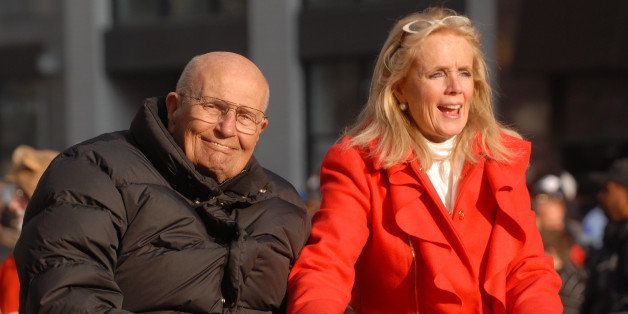DETROIT, MI - NOVEMBER 22: John Dingell (D-Mich) and his wife Debbie attend America's Thanksgiving Day Parade at Woodward Avenue on November 22, 2012 in Detroit, Michigan. (Photo by Paul Warner/Getty Images)