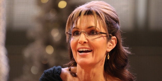 BLOOMINGTON, MN - NOVEMBER 22: Sarah Palin signs copies of her new book 'Good Tidings and Great Joy: Protecting the Heart of Christmas' on November 21, 2013 at Mall of America in Bloomington, Minnesota. (Photo by Adam Bettcher/Getty Images)