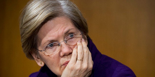 UNITED STATES - NOVEMBER 14: Sen. Elizabeth Warren, D-Mass., attends a Senate Banking Urban Affairs Committee hearing in Dirksen Building on Janet Yellen's confirmation to head the Federal Reserve. (Photo By Tom Williams/CQ Roll Call)