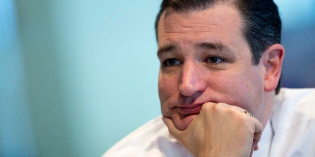 Senator Ted Cruz, a Republican from Texas, listens to a question during an interview in Washington, D.C., U.S., on Thursday, Jan. 30, 2014. Cruz vowed to use a debate over raising the federal debt ceiling as leverage to extract a new round of U.S. spending cuts, even as House Speaker John Boehner told reporters that defaulting would be 'the wrong thing' for the country. Photographer: Andrew Harrer/Bloomberg via Getty Images 