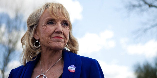 GLENDALE, AZ - FEBRUARY 28: Arizona Gov. Jan Brewer talks to the news media after voting in the Republican presidential prim