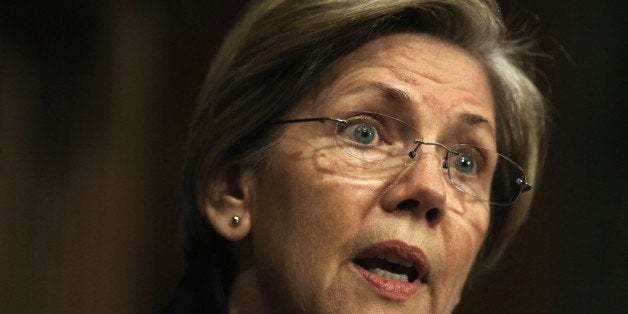 WASHINGTON, DC - NOVEMBER 14: U.S. Sen. Elizabeth Warren (D-MA) speaks during a confirmation hearing for Nominee for the Federal Reserve Board Chairman Janet Yellen before Senate Banking, Housing and Urban Affairs Committee November 14, 2013 on Capitol Hill in Washington, DC. Yellen will be the first woman to head the Federal Reserve if confirmed by the Senate and will succeed Ben Bernanke. (Photo by Alex Wong/Getty Images)