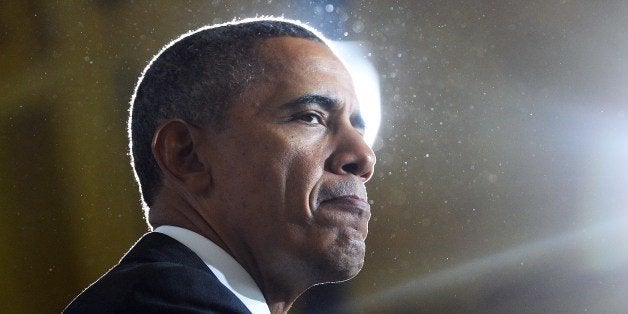 US President Barack Obama speaks at the Union Depot in St. Paul, Minnesota, on February 26, 2014. Obama announced new competi