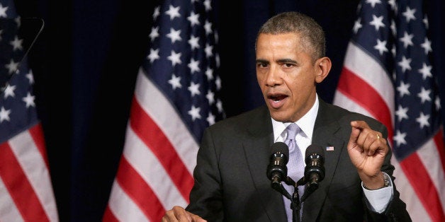 WASHINGTON, DC - FEBRUARY 28: U.S. President Barack Obama delivers remarks during the Democratic National Committee's Winter Meeting at the Capitol Hilton February 28, 2014 in Washington, DC. Obama said that the upcoming midterm elections will be a battle for the country's economic future and that Democrats will win with issues like the minimum wage, equal pay and college affordability. (Photo by Chip Somodevilla/Getty Images)