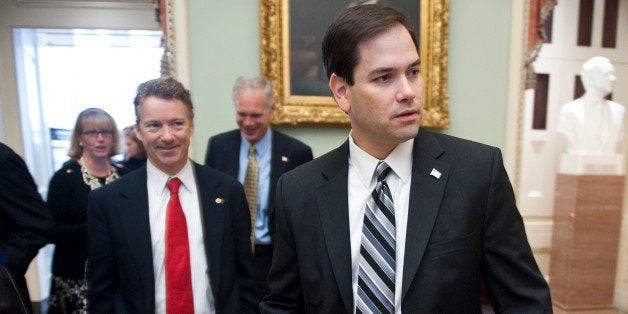 UNITED STATES Ð NOVEMBER 17: From left, Sen.-elect Rand Paul, R-Ky., and Sen.-elect Marco Rubio, R-Fla., leave the Mansfield