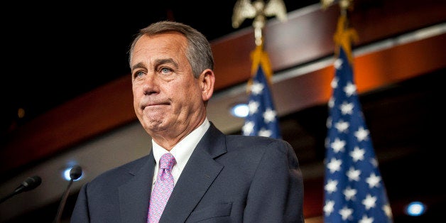 U.S. House Speaker John Boehner, a Republican from Ohio, speaks during a news conference at the Capitol in Washington, D.C., U.S., on Thursday, Feb. 6, 2014. Boehner said it would be difficult to pass an immigration bill because fellow Republicans dont trust President Barack Obama to implement the law, a position that shrinks chances for House action this year. Photographer: Pete Marovich/Bloomberg via Getty Images 