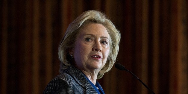 Former US Secretary of State Hillary Clinton speaks after receiving the 2013 Lantos Human Rights Prize during a ceremony on Capitol Hill in Washington on December 6, 2013. AFP PHOTO/Nicholas KAMM (Photo credit should read NICHOLAS KAMM/AFP/Getty Images)