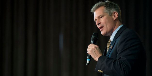 UNITED STATES - OCTOBER 21: Sen. Scott Brown, R-Mass., speaks at a rally in Cumnock Hall at the University of Massachusetts Lowell campus in Lowell, Mass. Brown is being challenged for his seat by democrat Elizabeth Warren. (Photo By Tom Williams/CQ Roll Call)