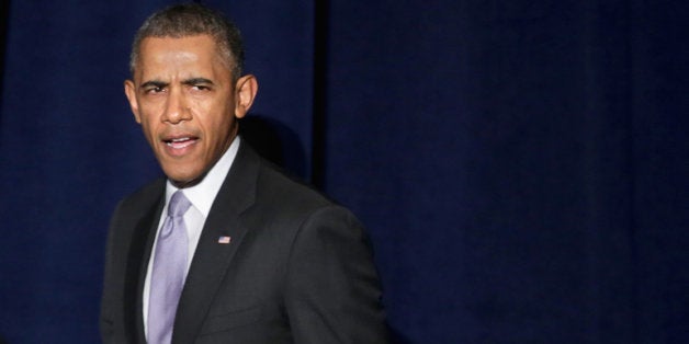 WASHINGTON, DC - FEBRUARY 28: U.S. President Barack Obama arrives at the Democratic National Committee's Winter Meeting at the Capitol Hilton February 28, 2014 in Washington, DC. Obama said that the upcoming midterm elections will be a battle for the country's economic future and that Democrats will win with issues like the minimum wage, equal pay and college affordability. (Photo by Chip Somodevilla/Getty Images)