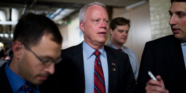 UNITED STATES - SEPTEMBER 26: Rep. Paul Broun, R-Ga., speaks with reporters as he leaves the House Republican Conference meet