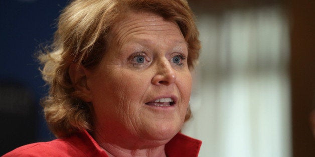 WASHINGTON, DC - APRIL 23: Sen. Heidi Heitkamp (D-ND) participates in a news conference about the Marketplace Fairness Act in the Dirksen Senate Office Building on Capitol Hill April 23, 2013 in Washington, DC. According to the bill's authors, the proposed legislation would provide states with the authority to require out-of-state retailers to collect and remit tax on purchases shipped into the state, allowing brick-and-mortar retailers to compete with online retailers. (Photo by Chip Somodevilla/Getty Images)