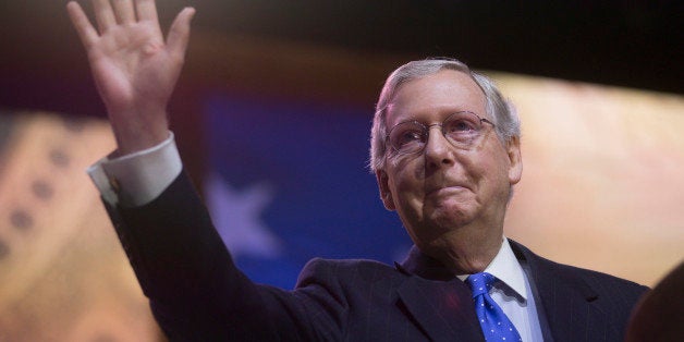 Senate Minority Leader Mitch McConnell, a Republican from Kentucky, gestures after speaking during the Conservative Political Action Conference (CPAC) in National Harbor, Maryland, U.S., on Thursday, March 6, 2014. CPAC, a project of the American Conservative Union (ACU), runs until Saturday, March 8. Photographer: Andrew Harrer/Bloomberg via Getty Images 