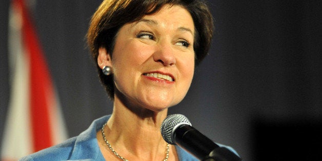 TAMPA, FL - NOVEMBER 02: Democratic candidate for Florida Governor Alex Sink speaks to the crowd while waiting for final results at her election night party during midterm elections on November 2, 2010 in Tampa, Florida. Sink is up against Republican gubernatorial candidate Rick Scott to fill the slot currently held by Florida Gov. Charlie Crist who is running for U.S. Senate. (Photo by Tim Boyles/Getty Images)