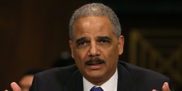 WASHINGTON, DC - JANUARY 29: Attorney General Eric Holder testifies during a Senate Judiciary Committee hearing on Capotil H