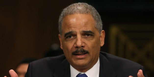 WASHINGTON, DC - JANUARY 29: Attorney General Eric Holder testifies during a Senate Judiciary Committee hearing on Capotil Hill, on January 29, 2014 in Washington, DC. The committee is hearing testimony on oversight of the Justice Department and reform of government surveillance programs. (Photo by Mark Wilson/Getty Images)