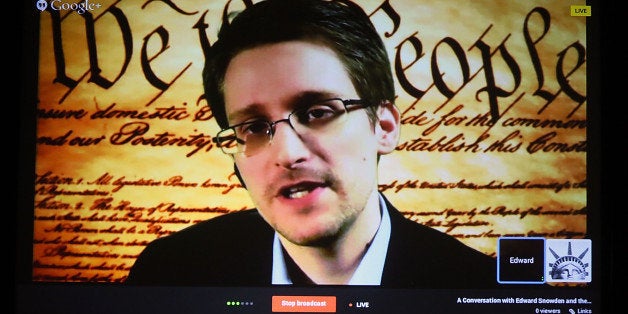 AUSTIN, TX - MARCH 10: Edward Snowden speaks via satelite from an undisclosed location during the South By Southwest Interactive Festival at the Austin Convention Center on March 10, 2014 in Austin, Texas. (Photo by Gary Miller/FilmMagic)