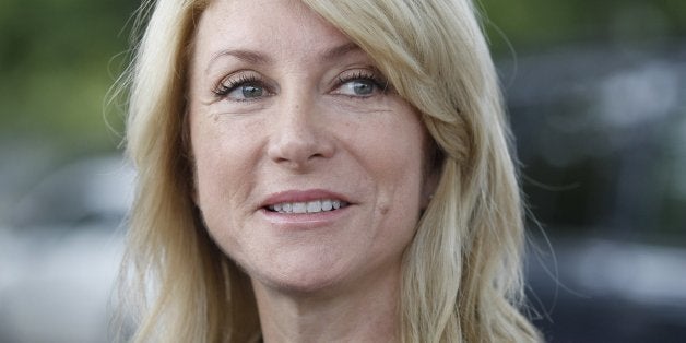 State Senator Wendy Davis speaks with reporters after voting at the Southside Community Center in east Fort Worth, Texas, October 18, 2013. (Ron T. Ennis/Fort Worth Star-Telegram/MCT via Getty Images)