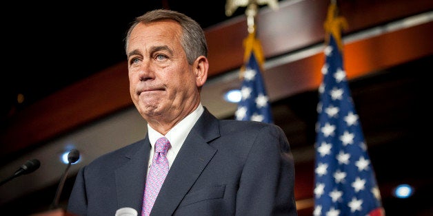 U.S. House Speaker John Boehner, a Republican from Ohio, speaks during a news conference at the Capitol in Washington, D.C., U.S., on Thursday, Feb. 6, 2014. Boehner said it would be difficult to pass an immigration bill because fellow Republicans dont trust President Barack Obama to implement the law, a position that shrinks chances for House action this year. Photographer: Pete Marovich/Bloomberg via Getty Images