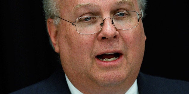 DALLAS, TX - APRIL 12: Karl Rove, former Deputy Chief of Staff and Senior Policy Advisor to U.S. President George W. Bush, prepares to lead a panel discussion at The 4% Project Conference on April 12, 2011 at Southern Methodist University in Dallas, Texas. The economic conference, sponsored by the George W. Bush Presidential Center, intends to increase awareness of public policies and private business strategies that increase opportunity and prosperity for Americans. (Photo by Tom Pennington/Getty Images)