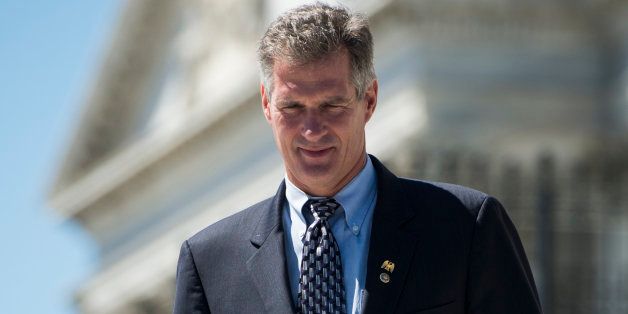 UNITED STATES - JULY 25: Sen. Scott Brown, R-Mass., waits to pose for photos on the Senate steps on Wednesday, July 25, 2012. (Photo By Bill Clark/CQ Roll Call)