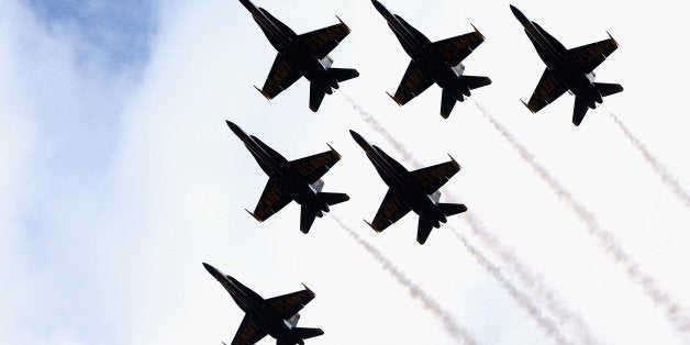 SOUTH BEND, IN - NOVEMBER 02: The U.S. Navy Blue Angels perform a stadium flyover before the Notre Dame Fighting Irish take
