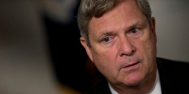 Thomas 'Tom' Vilsack, secretary of the U.S. Department of Agriculture (USDA), speaks after a Bloomberg Television interview in Washington, D.C., U.S., on Thursday, July 25, 2013. Monsanto Co. and the U.S.D.A. are investigating how genetically modified wheat that hasnt been approved for commercial use was found on an Oregon farm eight years after nationwide field tests ended. Photographer: Andrew Harrer/Bloomberg via Getty Images 