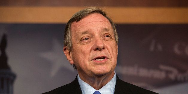 WASHINGTON, DC - OCTOBER 16: Sen. Dick Durbin (D-IL) speaks at a press conference after successfully pushing a bipartisan bill through the U.S. Senate to restart the government and raise the debt limit at the U.S. Capitol October 16, 2013 in Washington, DC. The bill still needs to be approved by the house. If the bill is signed into law, it will fund the government until January 15, 2014 and allow the government to pay bills until February 7, 2014. (Photo by Andrew Burton/Getty Images)