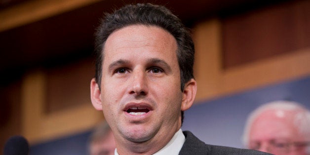 UNITED STATES - JANUARY 14: Sen. Brian Schatz, D-Hawaii, speaks during a news conference in the Capitol to announce the newly formed Senate Climate Change Task Force. (Photo By Tom Williams/CQ Roll Call)