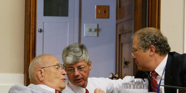 WASHINGTON - JUNE 23: Bart Stupak (D-MI) (C), Subcommittee Chairman House Subcommittee on Oversight and Investigations, talks to Chairman of House Energy and Commerce Committee Rep. John Dingell (D-MI) (L) as counsel John Sopko (R) looks on during a hearing before the subcommittee June 23, 2008 on Capitol Hill in Washington, DC. The hearing was to examine whether greater regulation is necessary to stop energy price manipulation. (Photo by Alex Wong/Getty Images)