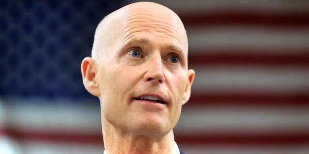 Florida Gov. Rick Scott delivers remarks at .decimal, Inc. (pronounced 'dot-decimal') during a visit to the medical device manufacturer's facility in Sanford, Monday, April 29, 2013. (Joe Burbank/Orlando Sentinel/MCT via Getty Images)