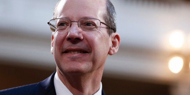 TRENTON, NJ - FEBRUARY 25: New Jersey State Supreme Court Chief Justice Stuart Rabner waits for Gov. Chris Christie to deliver his budget address for fiscal year 2015 to the Legislature, February 25, 2014 at the Statehouse in Trenton, New Jersey. The $34.4 billion state budget proposes increased spending for schools and healthcare and also includes the largest -ever payment to the public worker pension fund. (Photo by Jeff Zelevansky/Getty Images)