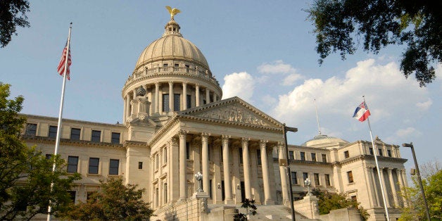 UNITED STATES - AUGUST 14: A cannon sits in front of the Mississippi State Capitol building, Aug. 14, 2007, in Jackson, Miss