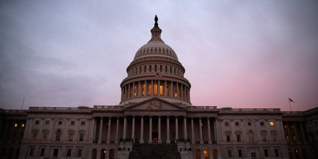 WASHINGTON, DC - MARCH 11: The American Flag flies over the Senate side of the U.S. Capitol, as Senate Democrats speak nonsto